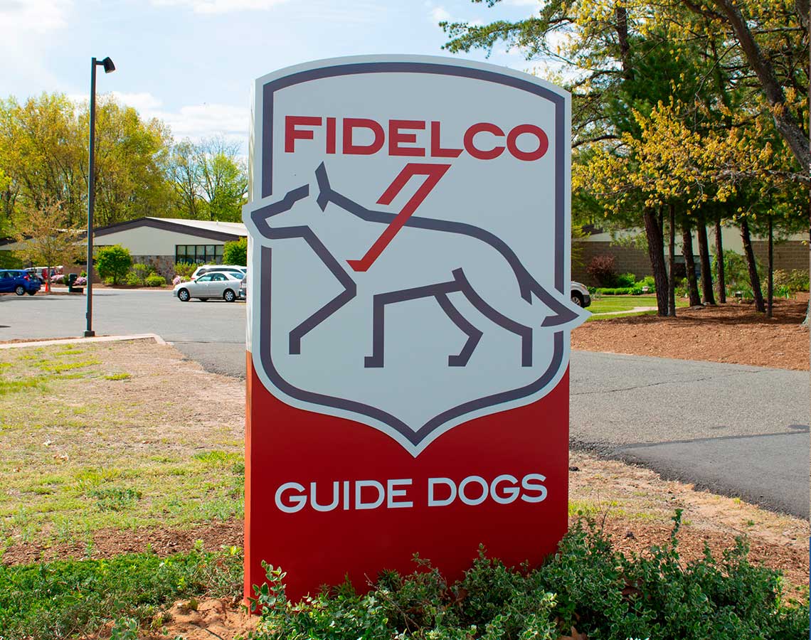 Fidelco Guide Dog signage in front of their office building 