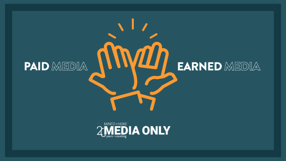 a high five graphic with paid media and earned media on each side along with the media only 20 years and counting logo 