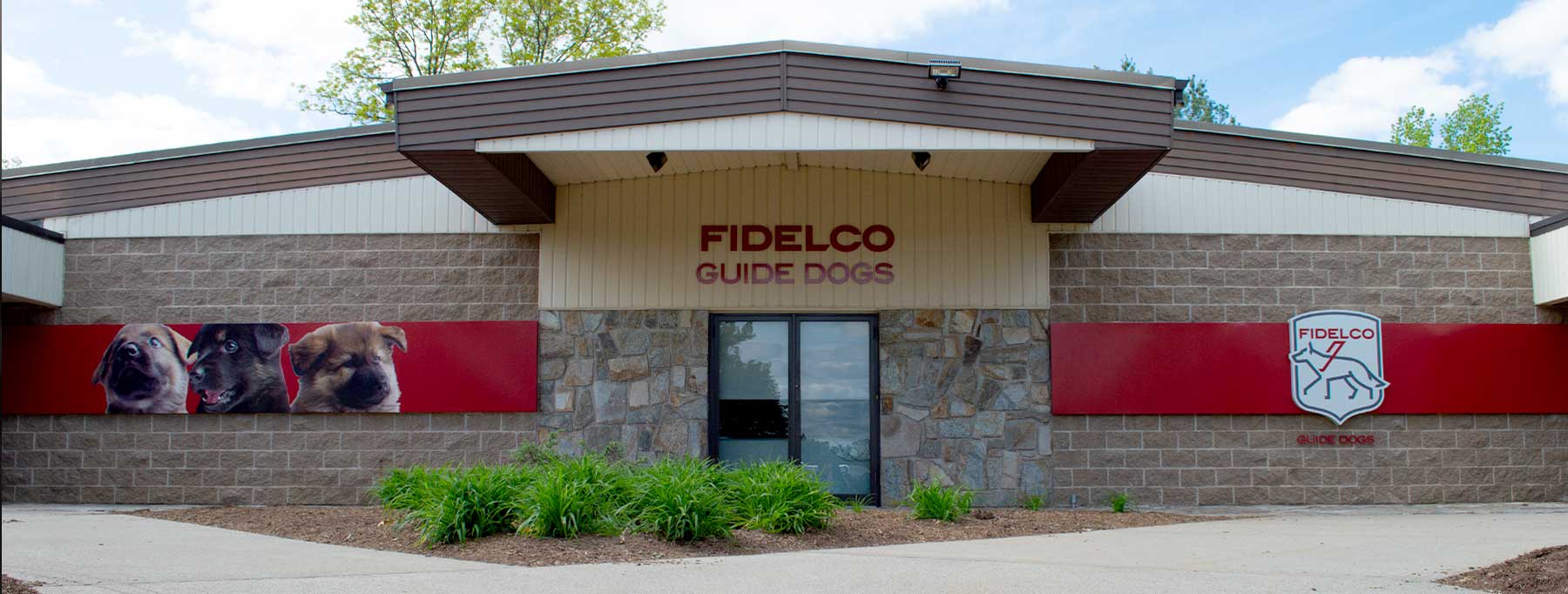 Fidelco Guide Dog signage on exterior of their office building 